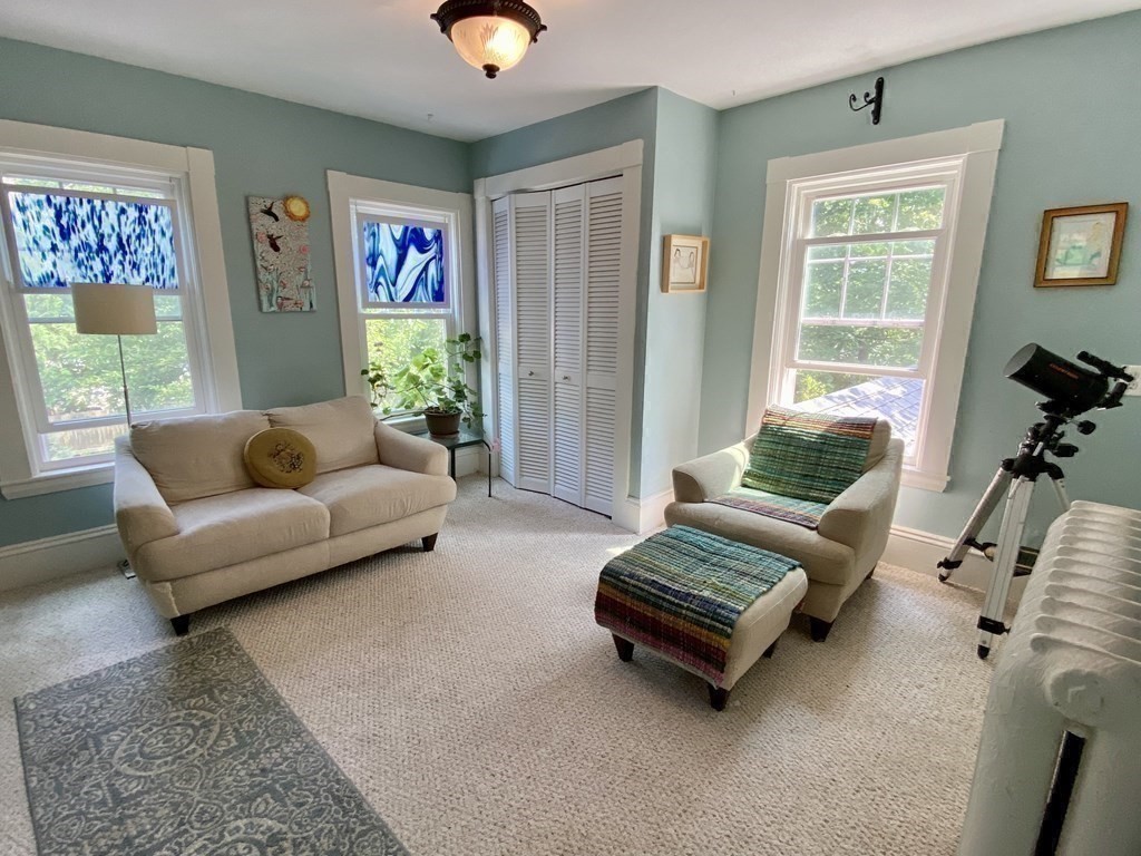 7 Grasshopper Lane Walpole, MA 02081 - Photo 19 of 42 a living room with furniture and a window