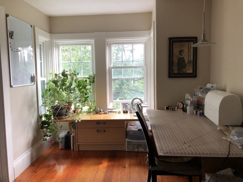 7 Grasshopper Lane Walpole, MA 02081 - Photo 32 of 42 a dining room with furniture and wooden floor