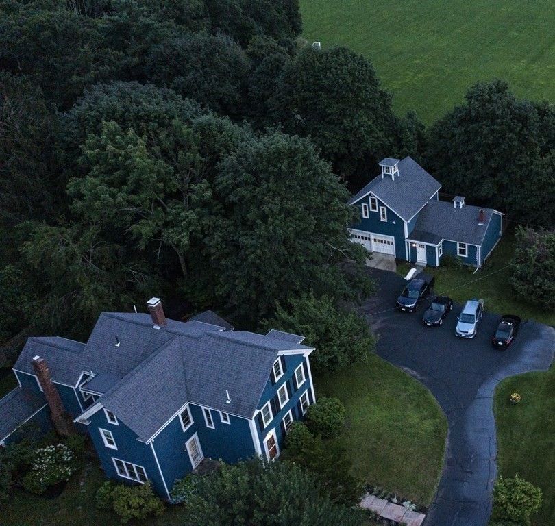 7 Grasshopper Lane Walpole, MA 02081 - Photo 42 of 42 an aerial view of a house with garden space and street view