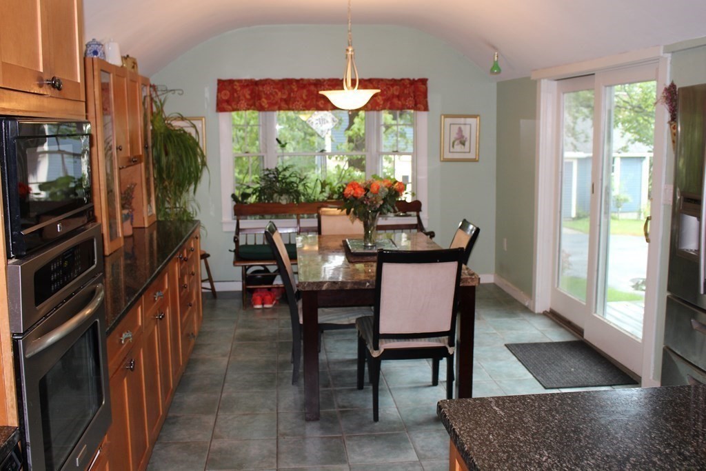 7 Grasshopper Lane Walpole, MA 02081 - Photo 9 of 42 a dining room with furniture and a floor to ceiling window