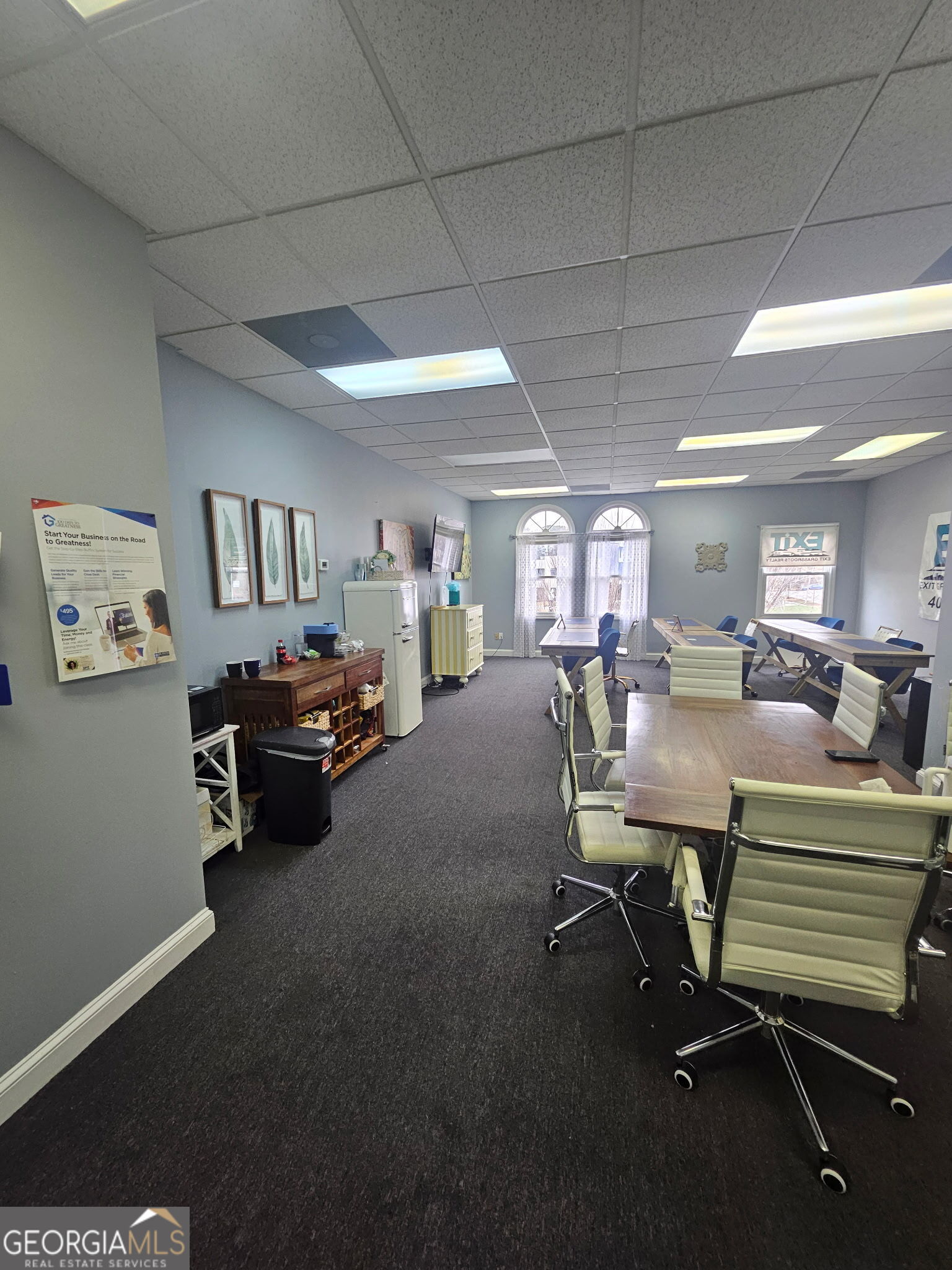 4448 Marietta Street, Unit 200 Powder Springs, GA 30127 - Photo 3 of 4 a room with gym equipment and a view of living room