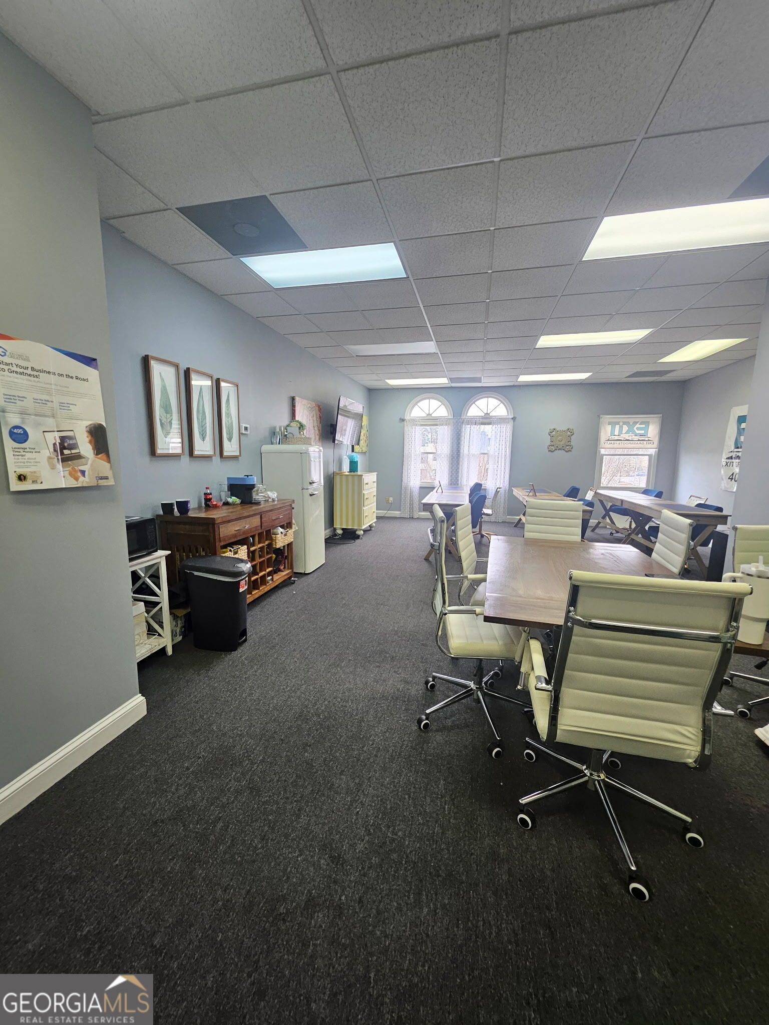 4448 Marietta Street, Unit 200 Powder Springs, GA 30127 - Photo 4 of 4 a view of a livingroom with furniture and a window