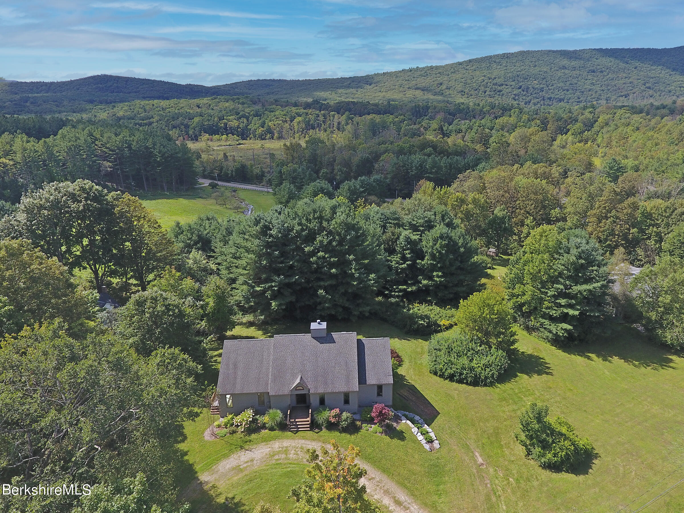 4 Hill Road Stockbridge, MA 01266 - Photo 2 of 41 an aerial view of a house with a garden