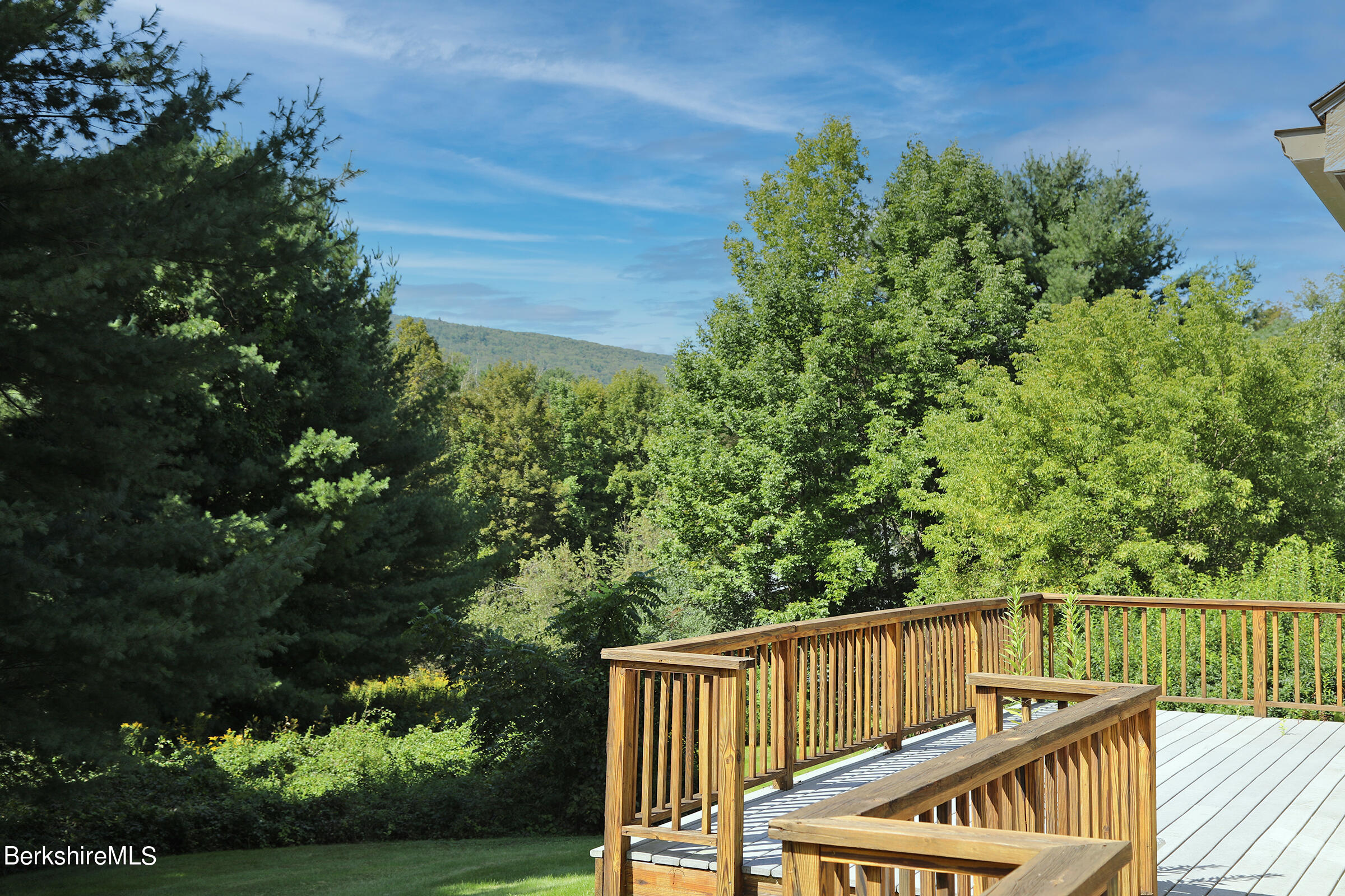 4 Hill Road Stockbridge, MA 01266 - Photo 22 of 41 a view of deck with furniture and trees