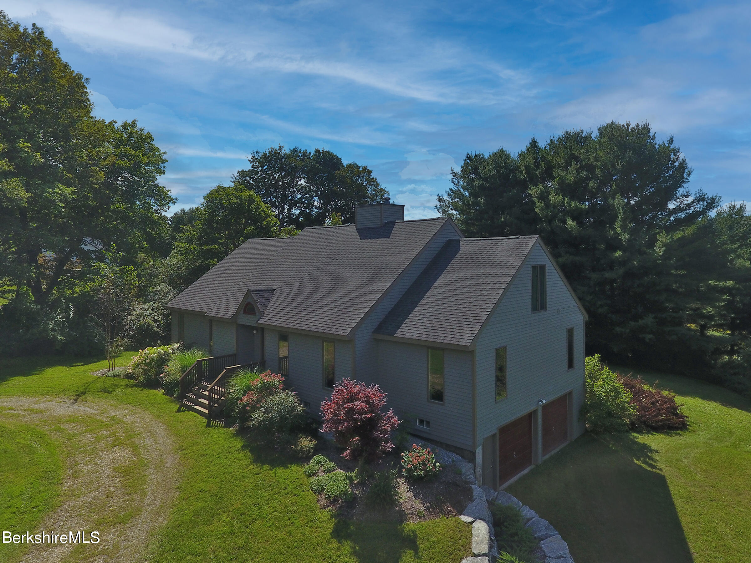 4 Hill Road Stockbridge, MA 01266 - Photo 4 of 41 a house view with a garden space