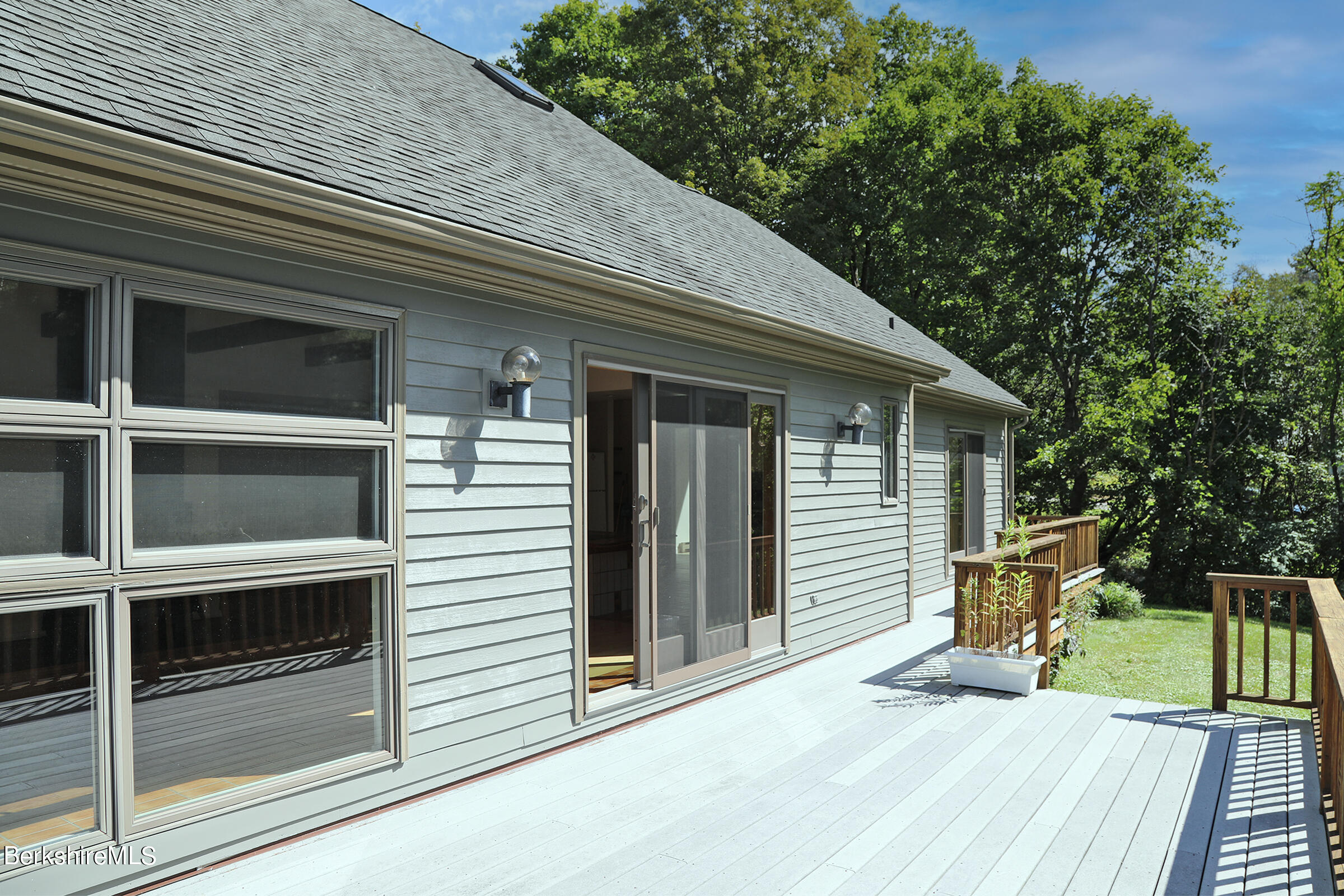 4 Hill Road Stockbridge, MA 01266 - Photo 31 of 41 a view of a house with a small deck