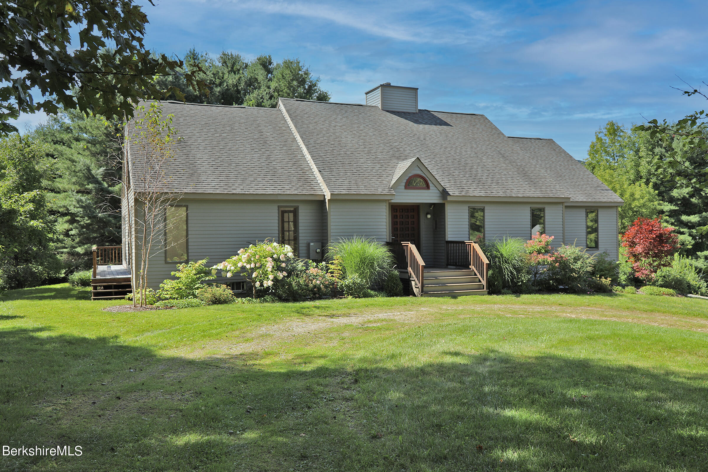 4 Hill Road Stockbridge, MA 01266 - Photo 40 of 41 a front view of a house with a yard