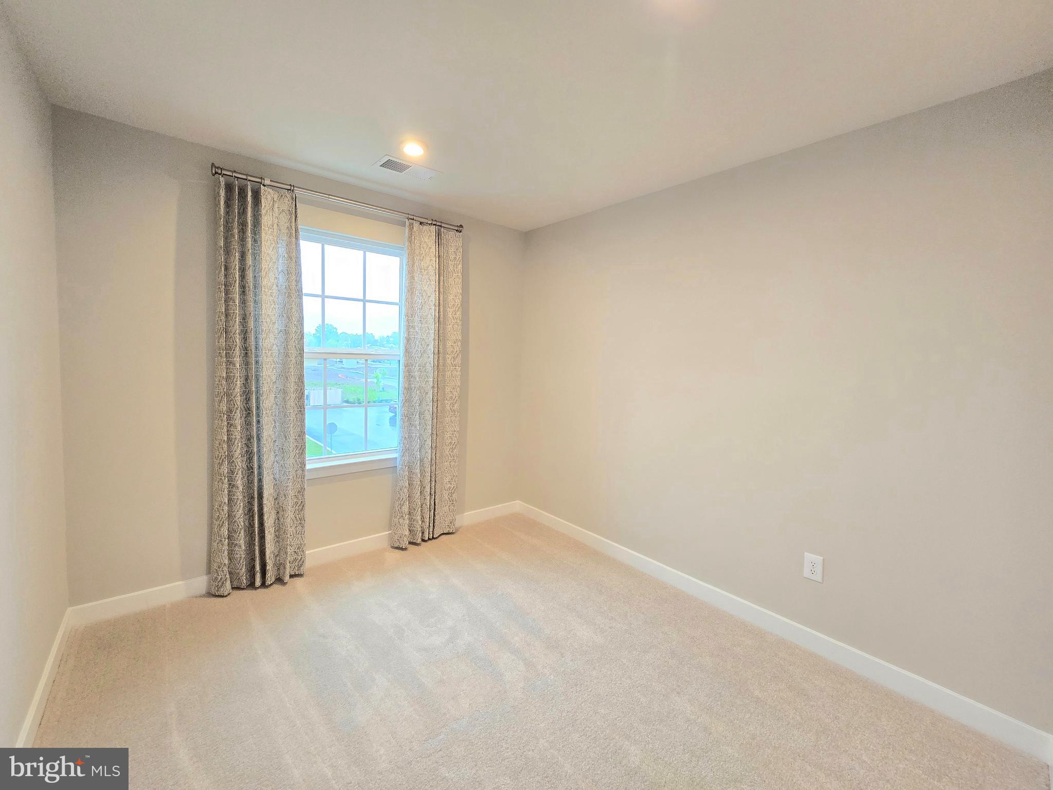 465 Market Street Souderton, PA 18964 - Photo 12 of 13 a view of an empty room and window