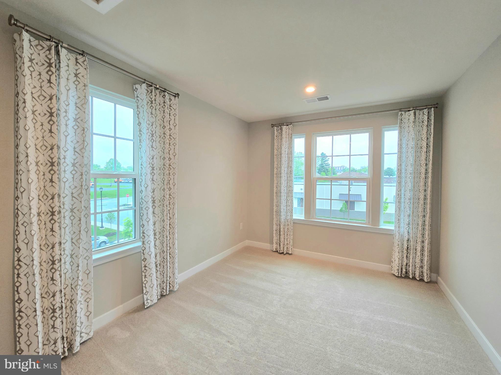 465 Market Street Souderton, PA 18964 - Photo 10 of 13 a view of an empty room with a window