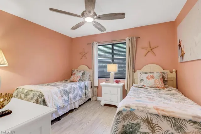 a view of storage and utility room with washer and dryer