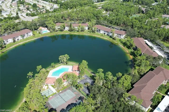 a view of a swimming pool with a lounge chairs