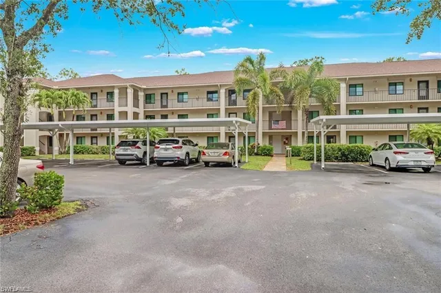 an aerial view of a house with a lake view
