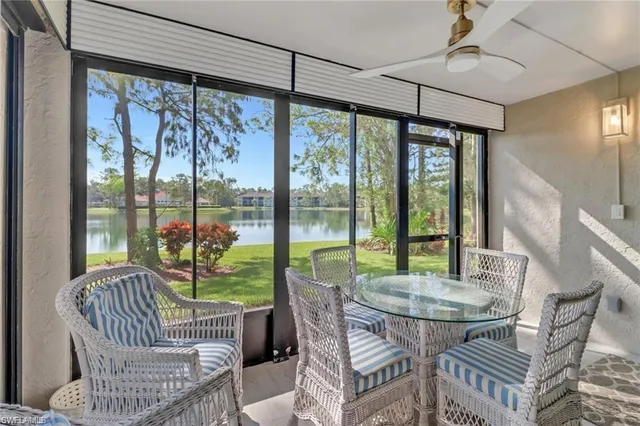 a kitchen with stainless steel appliances granite countertop a sink and a stove