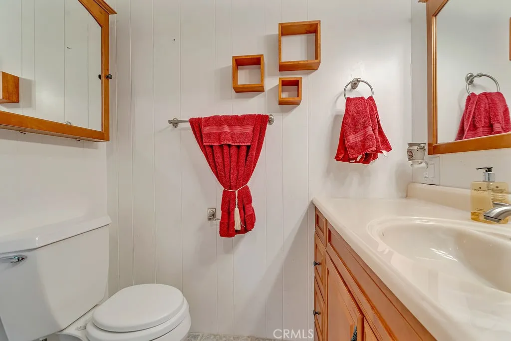 9999 Foothill, Unit 48 Rancho Cucamonga, CA 91730 - Photo 31 of 38 a bathroom with a toilet and a sink