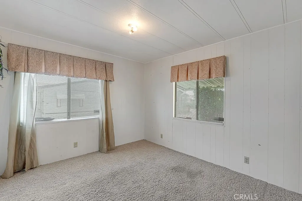 9999 Foothill, Unit 48 Rancho Cucamonga, CA 91730 - Photo 33 of 38 an empty room with windows
