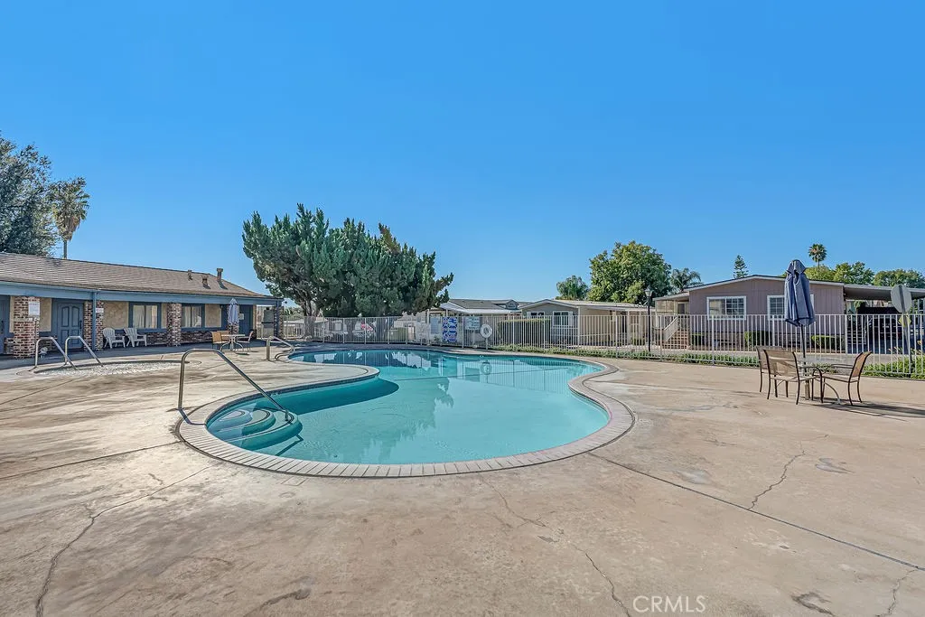 9999 Foothill, Unit 48 Rancho Cucamonga, CA 91730 - Photo 38 of 38 a view of a swimming pool with a patio