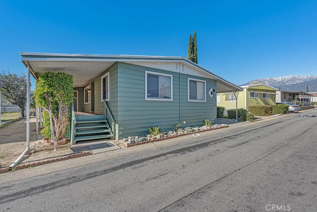9999 Foothill, Unit 48 Rancho Cucamonga, CA 91730 - Photo 7 of 38 front view of a house
