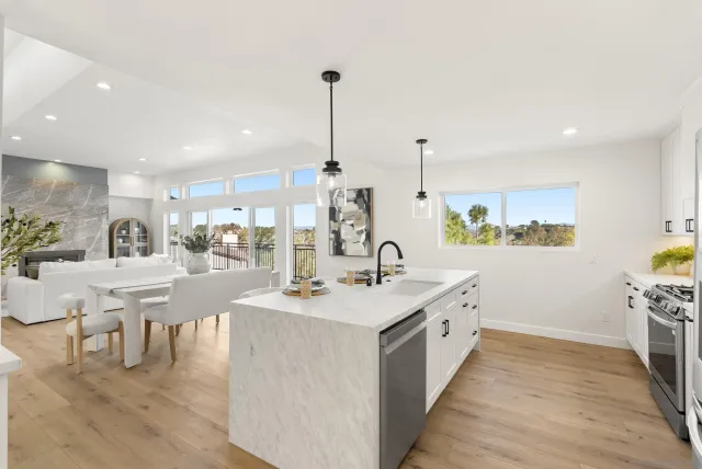 a spacious bedroom with a large bed and a window