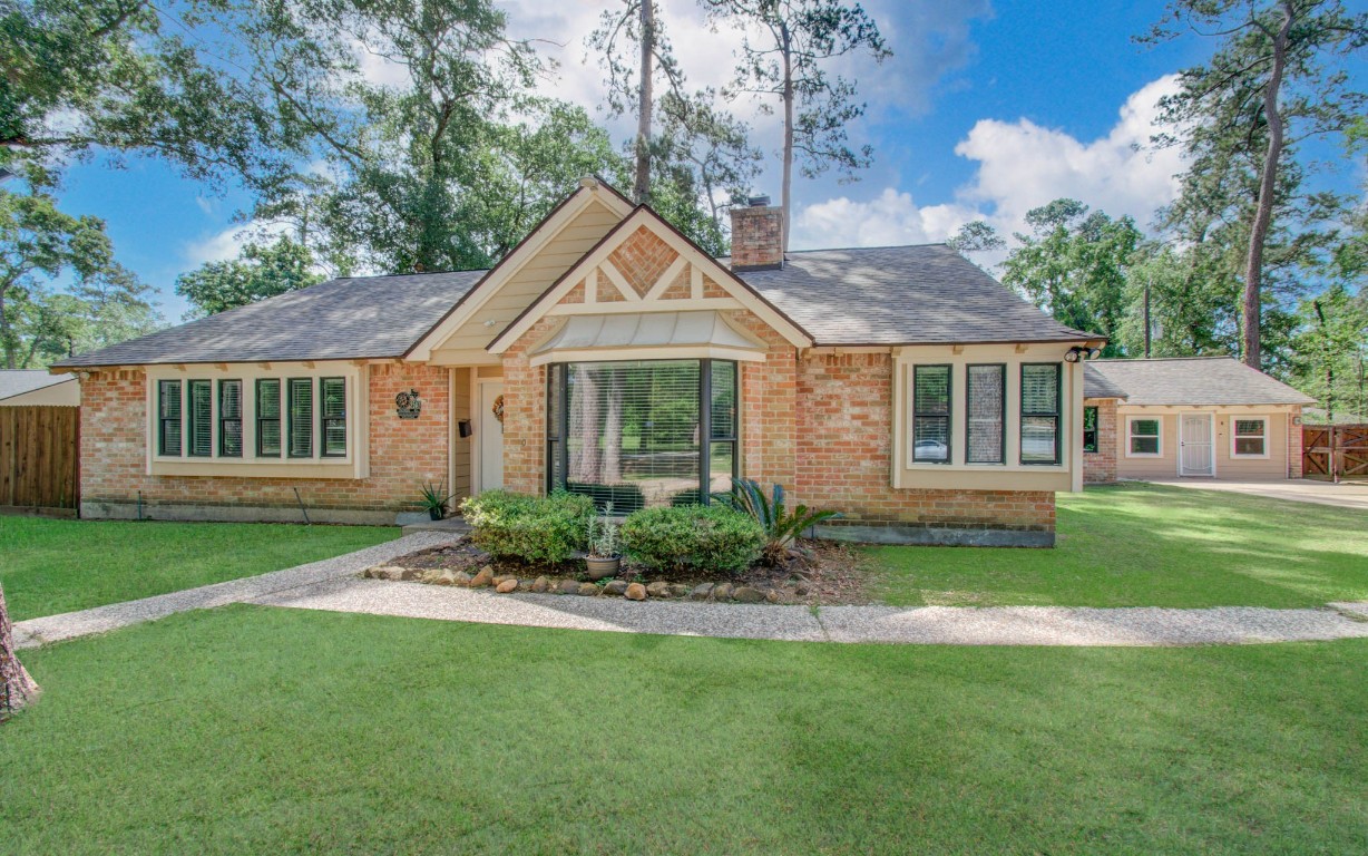 2507 Encreek Road Houston, TX 77068 - Photo 3 of 47 a front view of a house with a yard