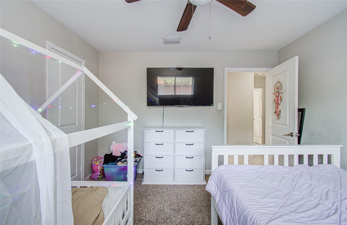 2507 Encreek Road Houston, TX 77068 - Photo 33 of 47 a bedroom with furniture and a window