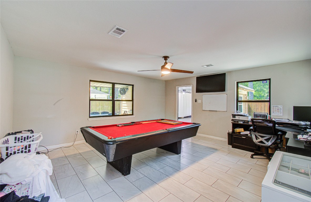 2507 Encreek Road Houston, TX 77068 - Photo 36 of 47 a living room with furniture and flat screen tv