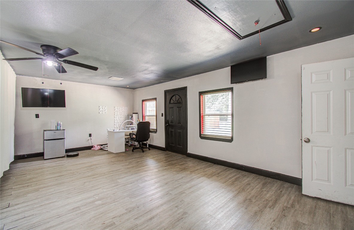 2507 Encreek Road Houston, TX 77068 - Photo 40 of 47 a living room with furniture and a flat screen tv