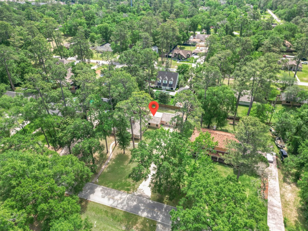 2507 Encreek Road Houston, TX 77068 - Photo 44 of 47 an aerial view of residential houses with outdoor space and trees
