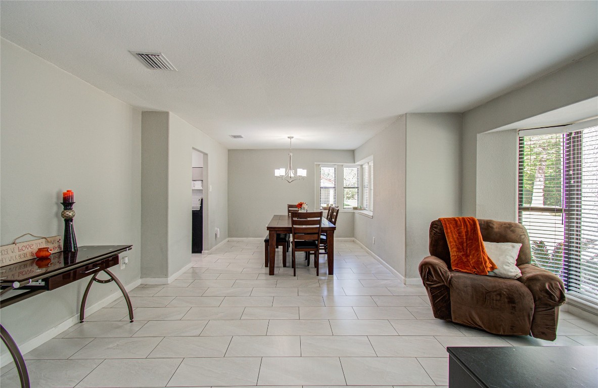 2507 Encreek Road Houston, TX 77068 - Photo 8 of 47 a living room with furniture and a window