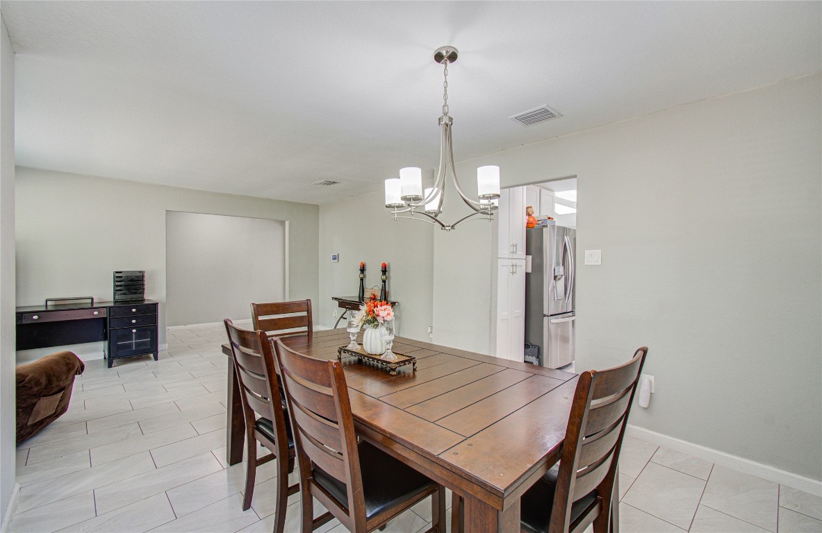 2507 Encreek Road Houston, TX 77068 - Photo 10 of 47 a view of a dining room with furniture