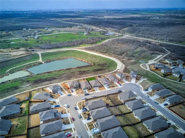 a view of a yard with an outdoor space