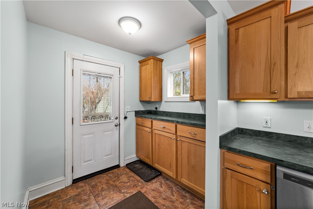 1680 Lee Road Cleveland, OH 44118 - Photo 14 of 45 Kitchen with dishwasher and dark tile floors