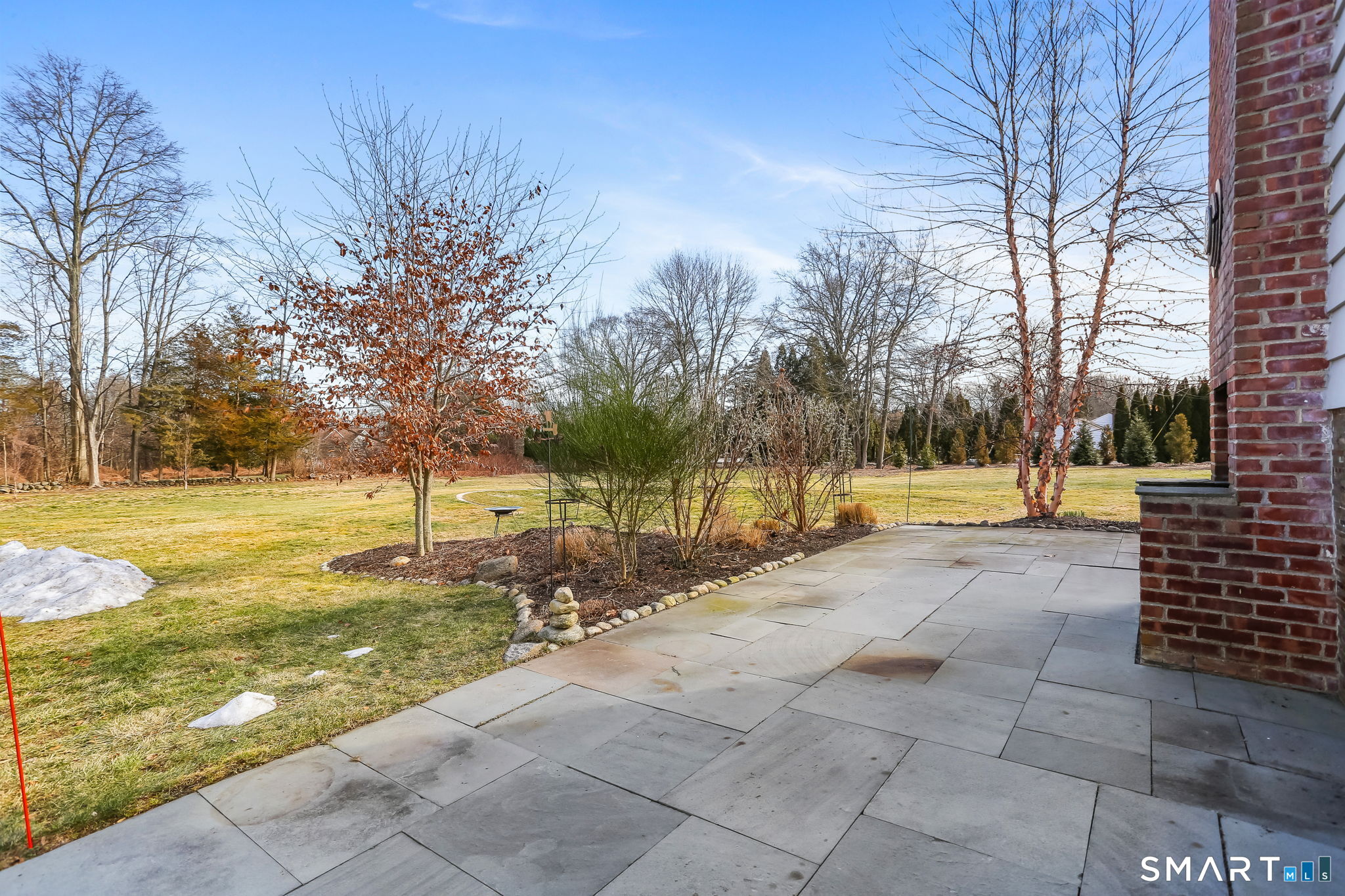 98 Comstock Hill Avenue Norwalk, CT 06850 - Photo 35 of 40 a view of a yard with trees