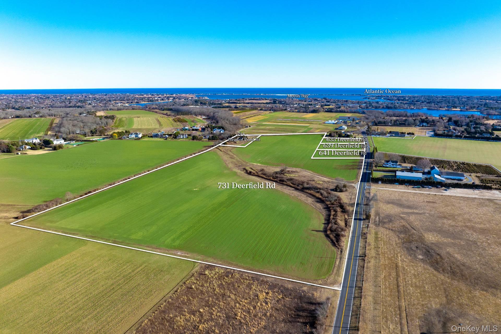 731 Deerfield Road Water Mill, NY 11976 - Photo 2 of 5 a view of a tennis court