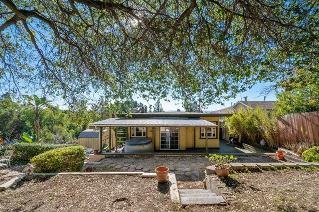 front view of a house with a small yard
