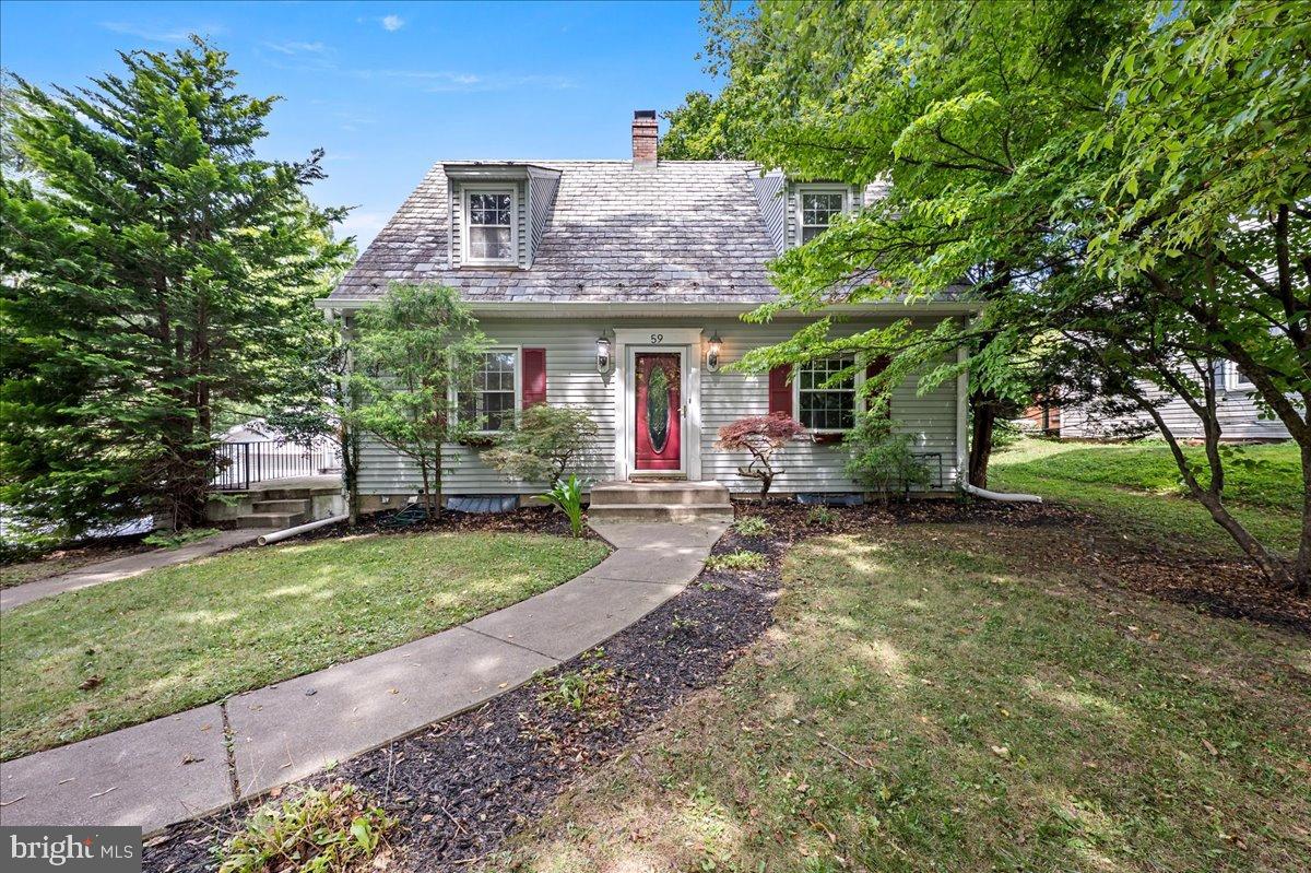 59 West Macada Road Bethlehem, PA 18017 - Photo 1 of 31 Charming home with lush greenery and inviting p...