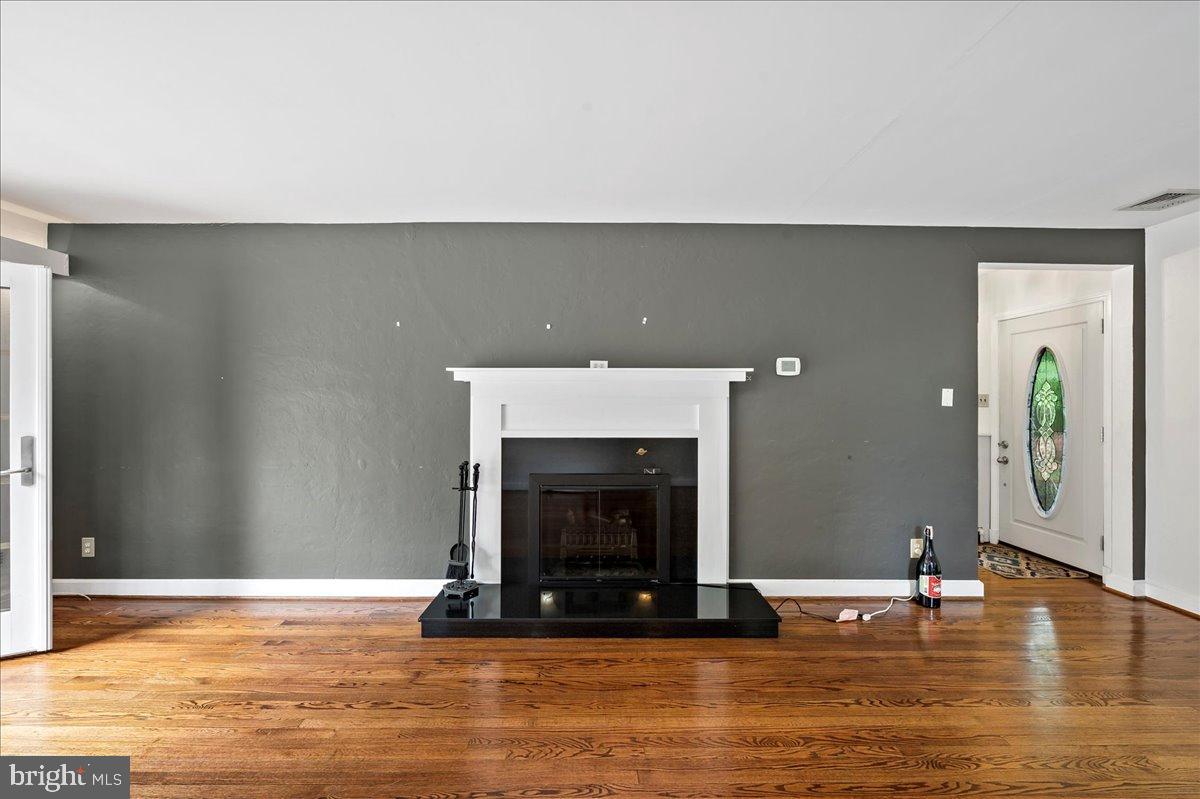 59 West Macada Road Bethlehem, PA 18017 - Photo 12 of 31 Spacious living area with elegant fireplace.