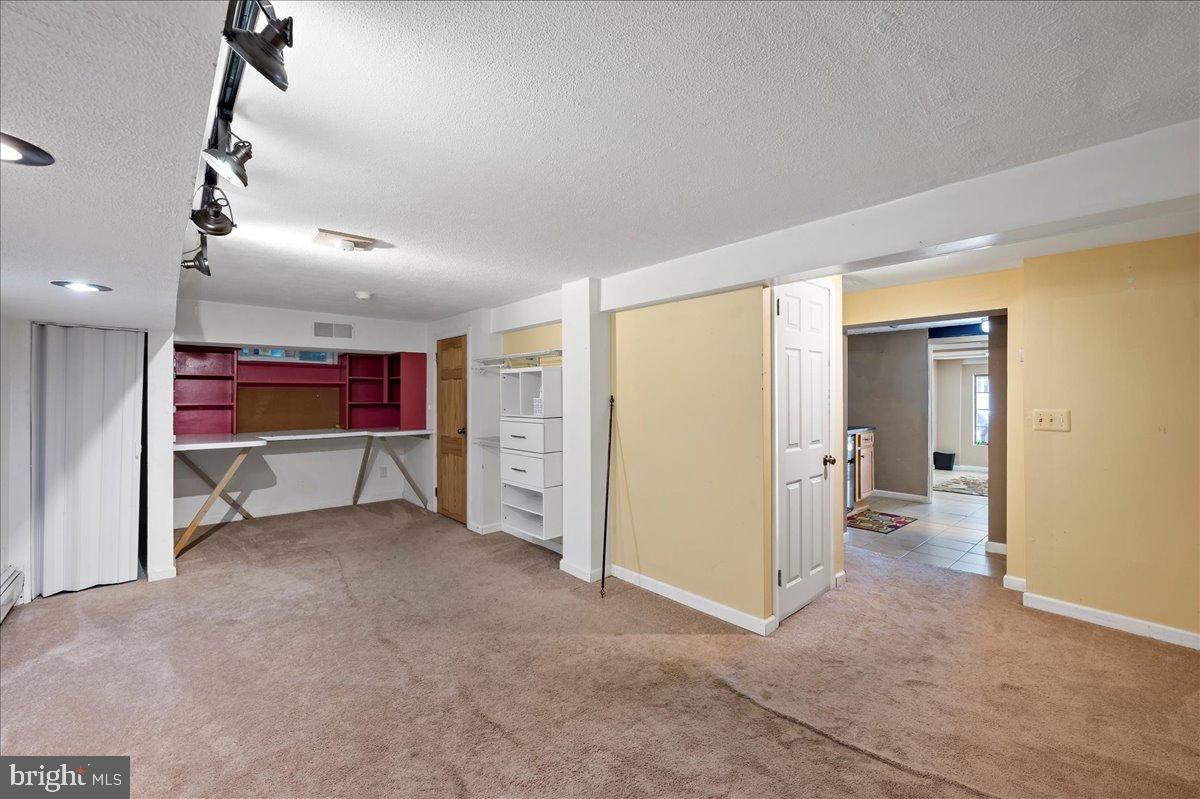 59 West Macada Road Bethlehem, PA 18017 - Photo 25 of 31 Versatile basement space ready for your vision.