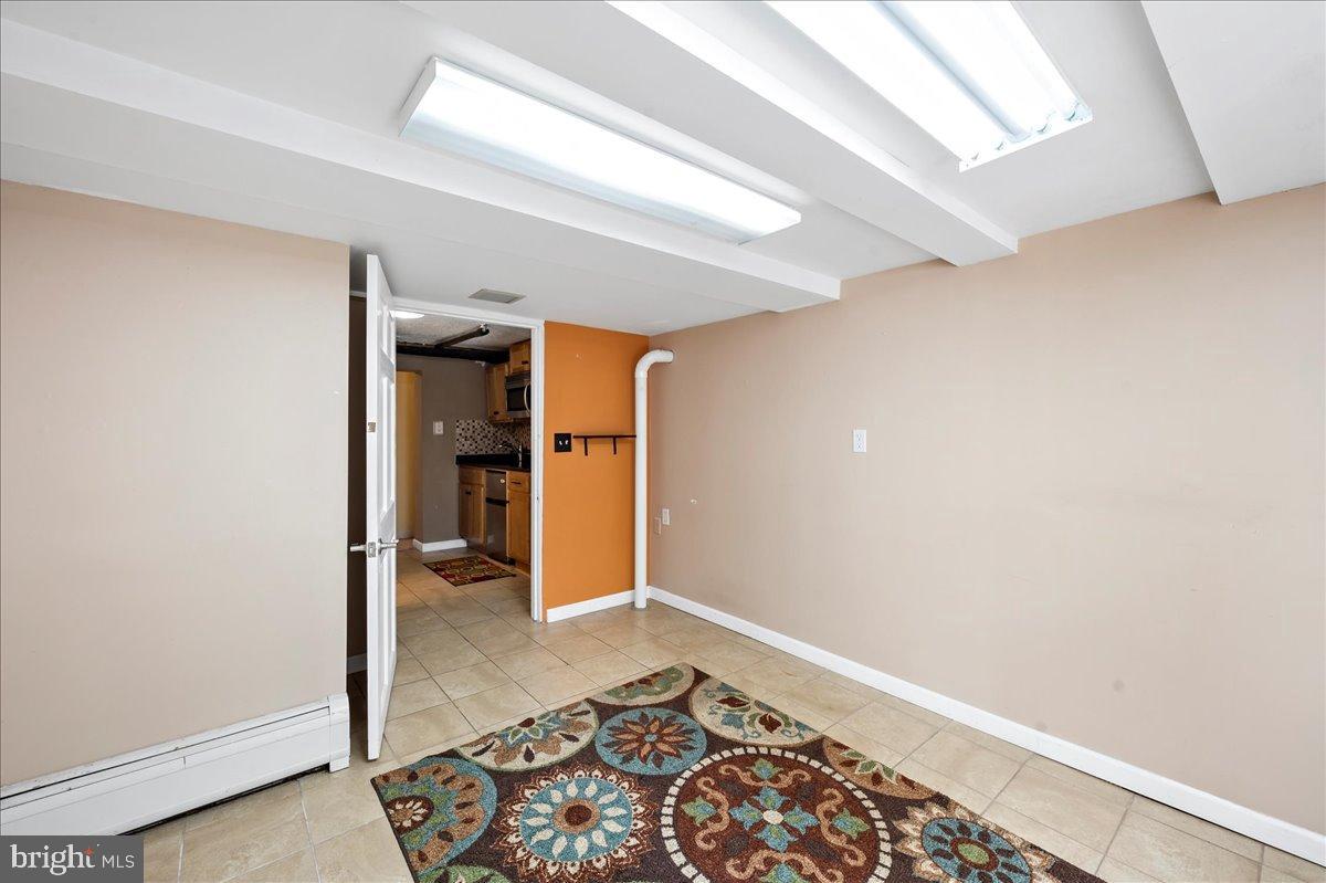 59 West Macada Road Bethlehem, PA 18017 - Photo 28 of 31 Versatile space with modern lighting and charm.