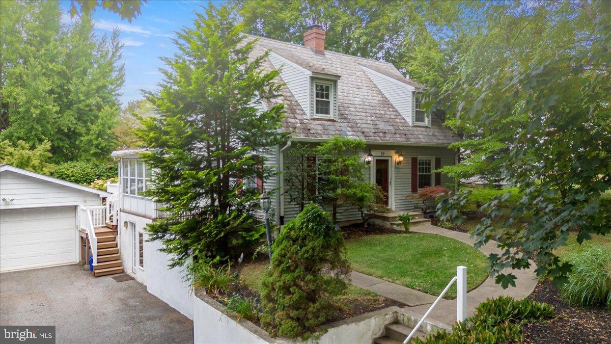 59 West Macada Road Bethlehem, PA 18017 - Photo 3 of 31 Charming home nestled among lush greenery.