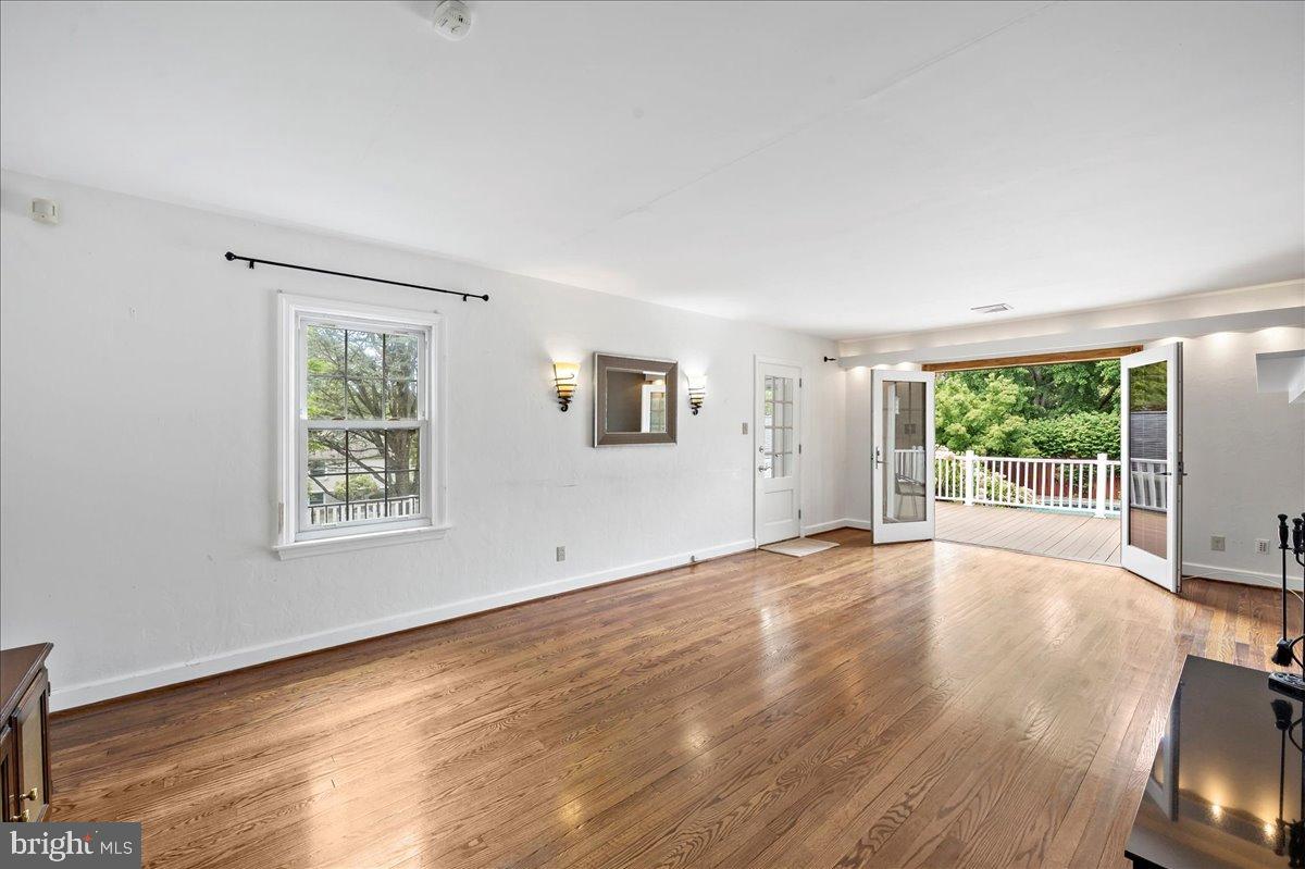 59 West Macada Road Bethlehem, PA 18017 - Photo 8 of 31 Bright and airy living space with outdoor access.