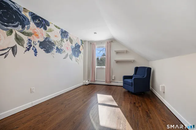 wooden floor in a hall with an entryway