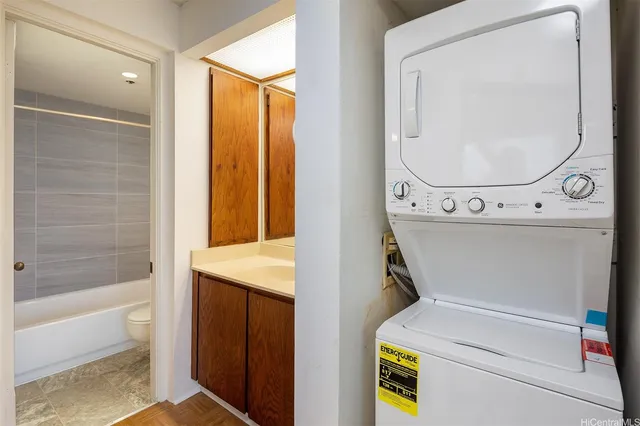 a utility room with dryer and washer