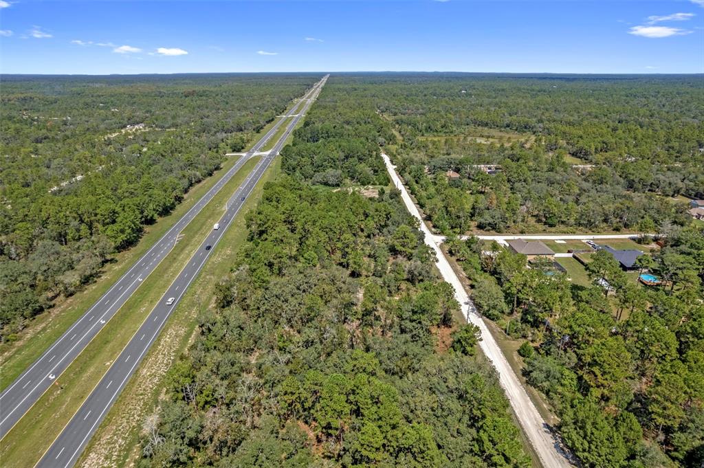18172 Commercial Way Weeki Wachee, FL 34614 - Photo 4 of 12 a view of a balcony with an outdoor space