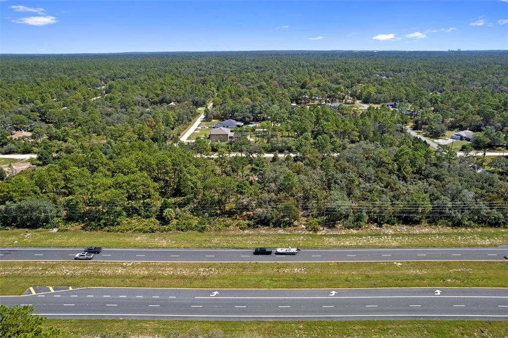18172 Commercial Way Weeki Wachee, FL 34614 - Photo 7 of 12 a view of outdoor space and yard