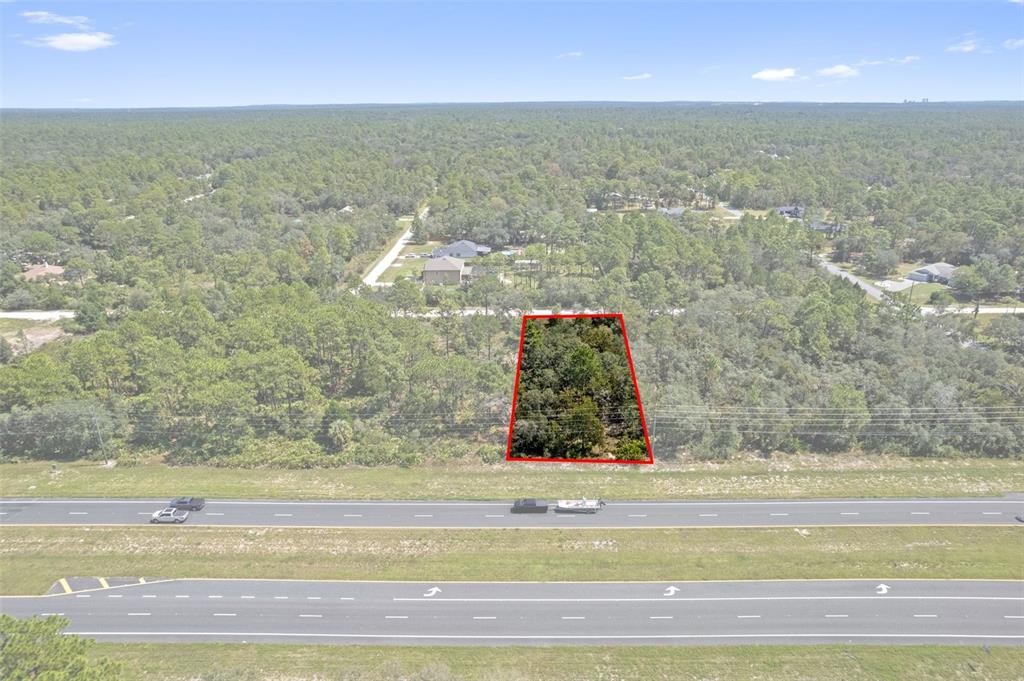 18172 Commercial Way Weeki Wachee, FL 34614 - Photo 8 of 12 a bathroom with a bathtub and shower