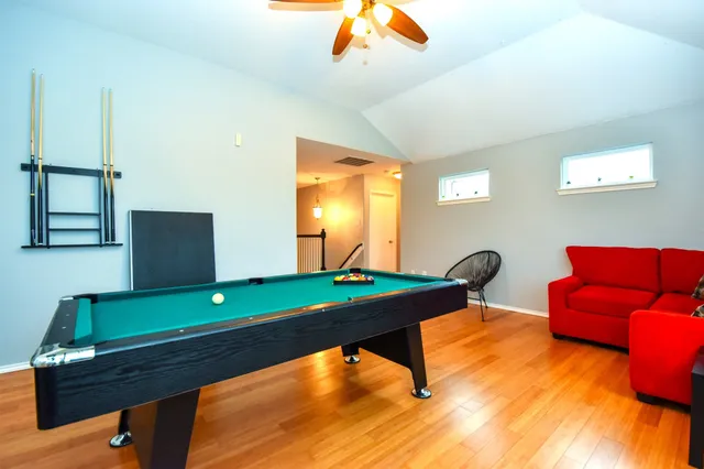 a living room with furniture and a table