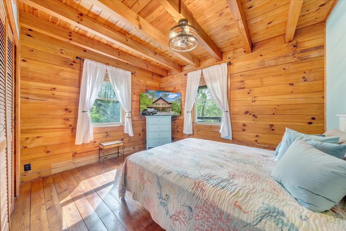 13357 Callaway Road Callaway, VA 24067 - Photo 20 of 62 a bedroom with a bed and a large window