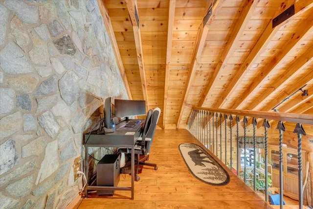 a view of an entryway with wooden floor
