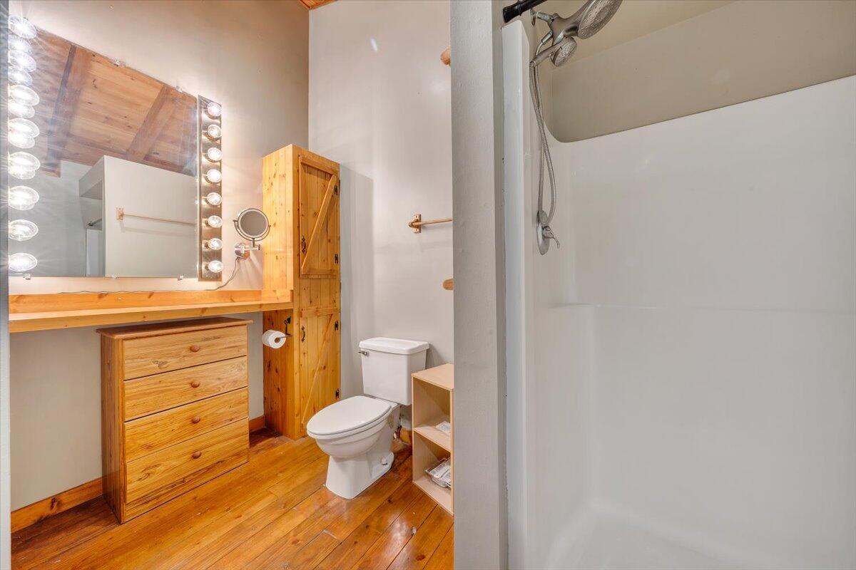 13357 Callaway Road Callaway, VA 24067 - Photo 29 of 62 a bathroom with a sink a toilet and shower