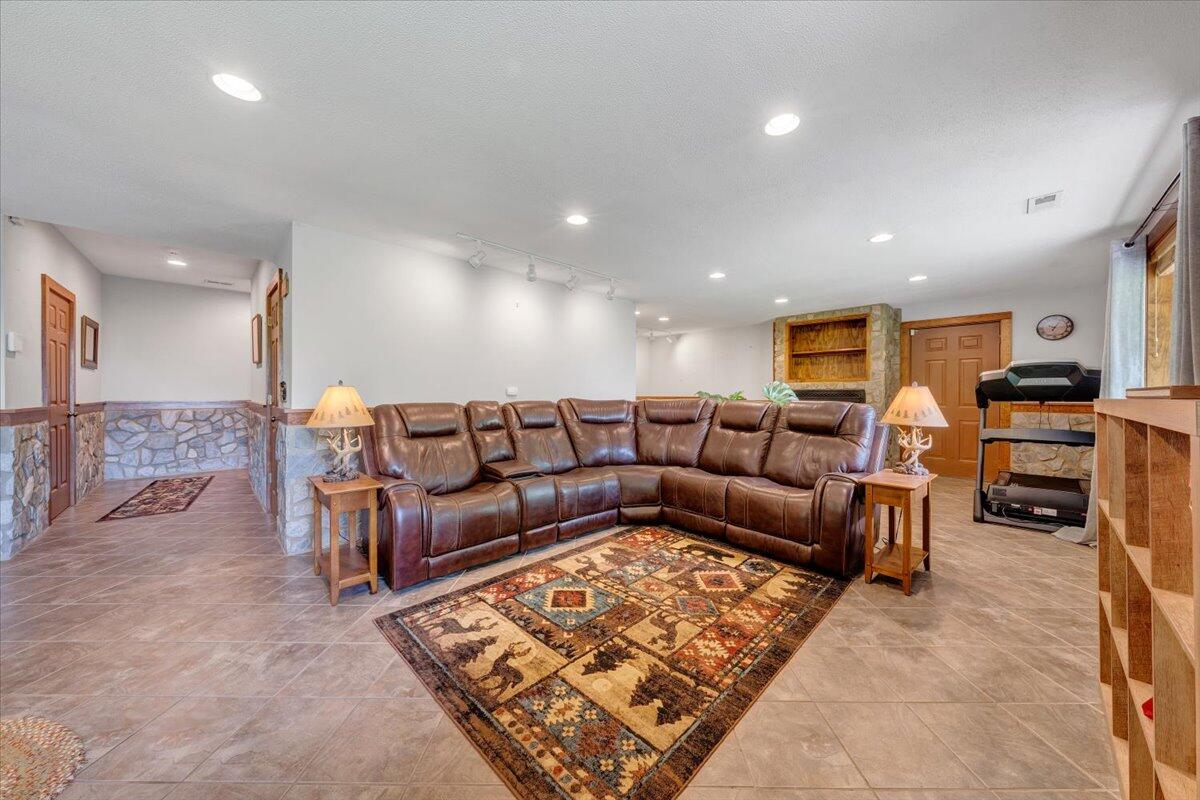 13357 Callaway Road Callaway, VA 24067 - Photo 36 of 62 a living room with furniture and a flat screen tv